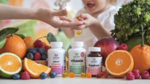 A variety of vibrant fruits like oranges, berries, and leafy greens alongside kid-friendly vitamin bottles and supplement gummies for child's immune system. A parent is subtly handing vitamins to a child, set against a soft, healthy-toned backdrop